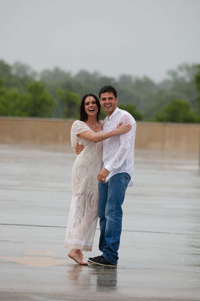 fun couple in the rain